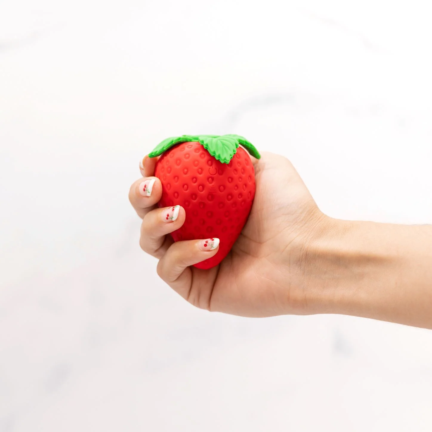 Strawberry Emojibator suge-vibrator med 8 mønstre